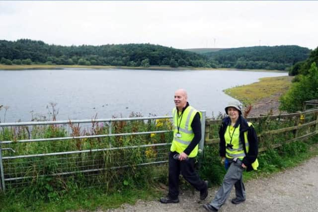 Jeff Platts and Helen Mariott on patrol at Ogden Water. Pic: Jonathanm Gawthorpe