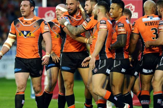 The Castleford's squad celebrate Mike McMeeken's try.