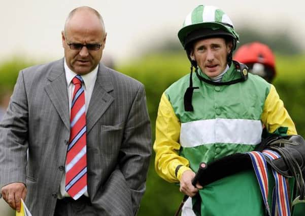 Jockey Paul Hanagan, right.