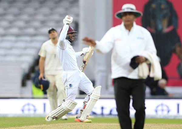 West Indies Shai Hope celebrates after scoring the winning runs against England on day five at Headingley. Picture: Nigel French/PA