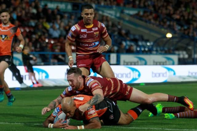 Jake Webster scores the opening try for Castleford Tigers.