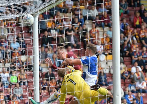 Hat-trick header: Charlie Wyke scores his third goal past Sam Slocombe.
Picture: Bruce Rollinson