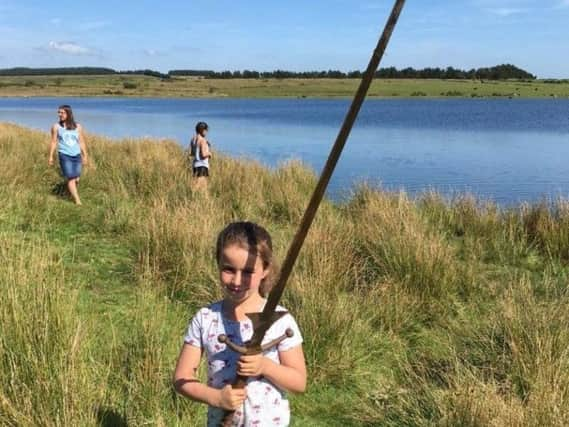 Matilda Jones with the 'Excalibur' sword she found.