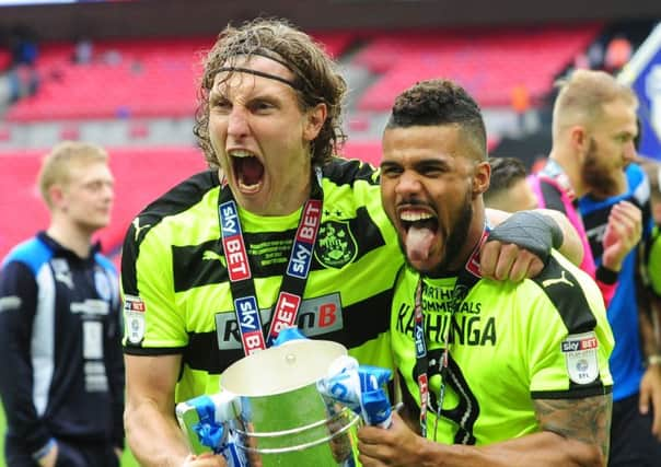 Michael Hefele and Elias Kachunga celebrate Huddersfield Towns play-off success over Reading (Picture: Simon Hulme).