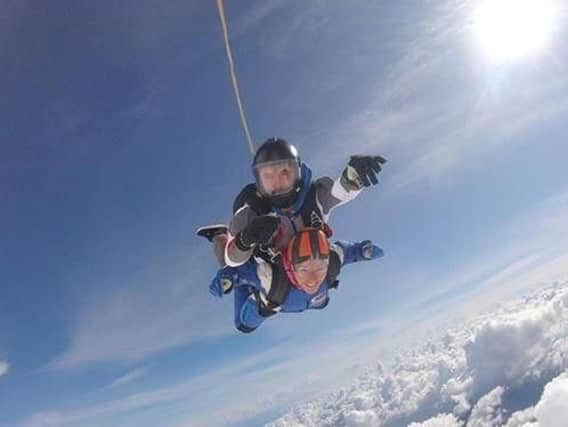 Diving from a plane at 15,000 ft.