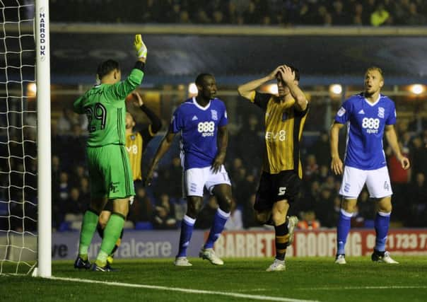 AGONY: Sheffield Wednesday's Kieran Lee shows his frustration after a late chance goes begging. Picture: Steve Ellis