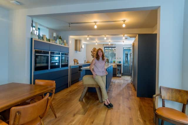 Carole in the living kitchen, which was part of the basement conversion. She designed the kitchen cabinets, which were made by a local joiner.