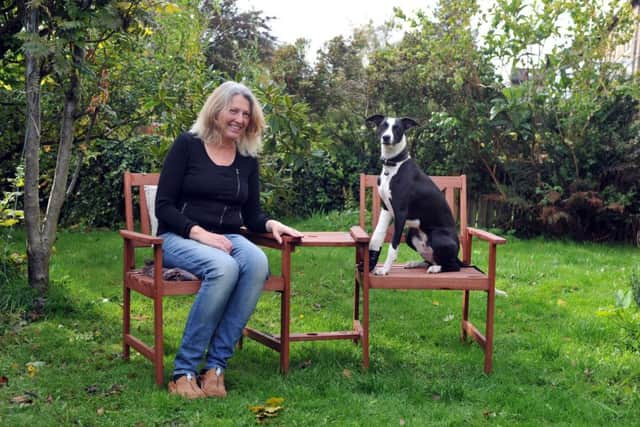 Alison Lock  with her dog, Casper at home in Meltham.  Picture Tony Johnson