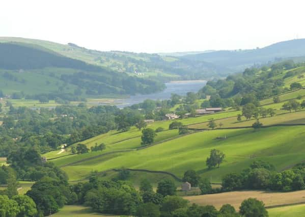 A view across Upper Nidderdale from Middlesmoor, one of the stops along the Nidderdale Way.  Picture by Janina Holubecki.