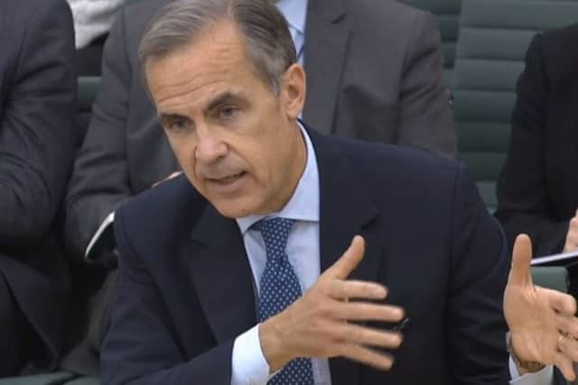 Governor of the Bank of England, Mark Carney, gives evidence to the Treasury Select Committee in Portcullis House, London.