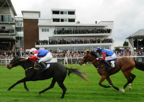 American Craftsman wins the first race of the new season of racing at Wetherby. 
Picture Jonathan Gawthorpe