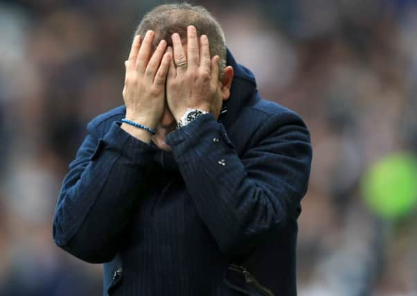 Head in hands: Carlos Carvalhal on the touchline at Derby. 
Picture: Steve Ellis