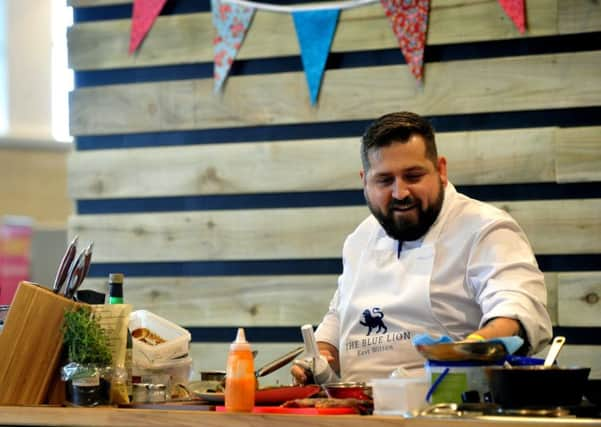 Jon Appleby, head chef at The Blue Lion at East Witton giving his first ever cookery demonstration  in the Cookery Theatre at Countryside Live. Picture by Gary Longbottom.