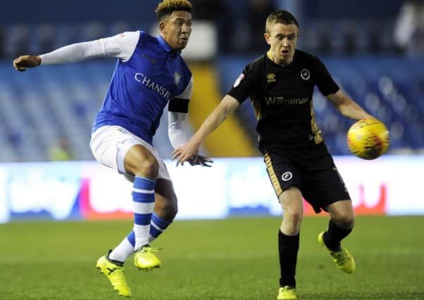 Back in action: Liam Palmer with Millwall's Shane Ferguson.