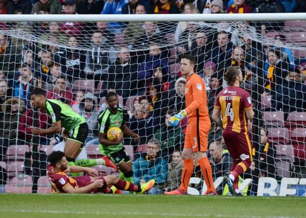 Beaten: Bradford goalkeeper Colin Doyle is dejected as Jake Jervis turns to celebrate Plymouth's winner.
Picture: Bruce Rollinson