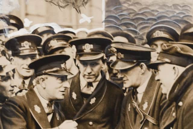 The Daily Herald picture showing the heads of bus strikers drawn in. Picture: National Science and Media Museum