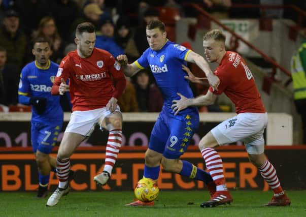 Chris Wood sandwiched between Gethin Jones and Marc Roberts during last season's encounter, which the hosts won 3-2.  Picture: Bruce Rollinson