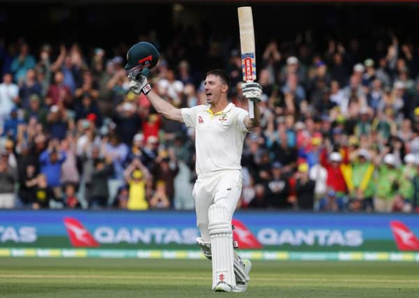 MAGIC MOMENT: Australia's Shaun Marsh celebrates his century on day twoat the Adelaide Oval. Picture: Jason O'Brien/PA