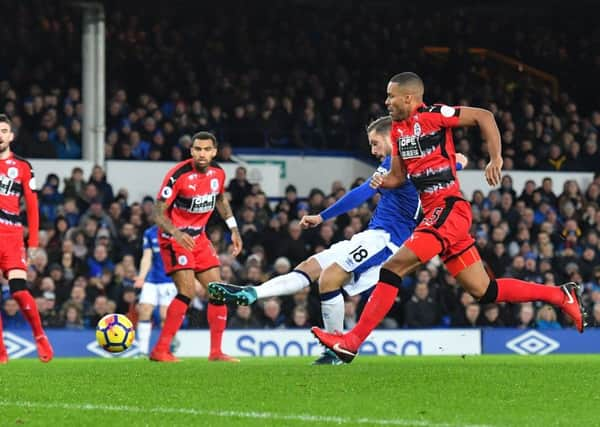 Gylfi Sigurdsson fires in the first of Evertons two goals against Huddersfield Town (Picture: Dave Howarth/PA Wire).