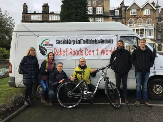 Some of the members of the public against a relief road gathering before the North Yorkshire County Council meeting. (Picture by Hollie Bone)