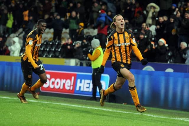 ackson Irvine celebrates scoring the third goal against Brentford. (Picture: Tony Johnson)