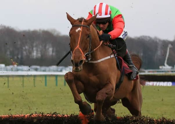 Definitly Red (right) ridden by Richard Johnson (Picture: PA)