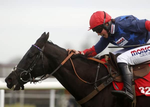 Black Corton and Bryony Frost win The 32Red Kauto Star Novices' Steeple Chase Race.