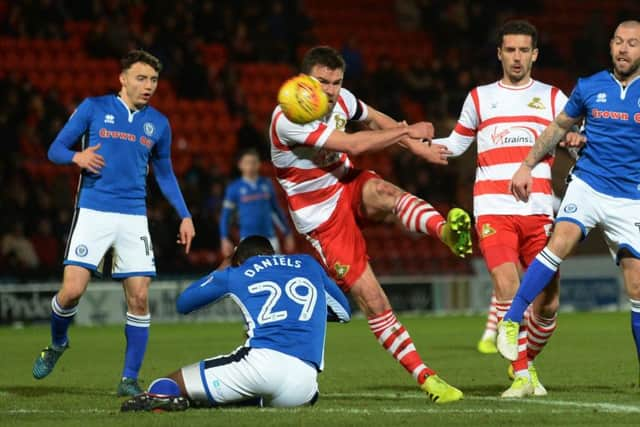 Ben Whiteman puts through a shot.