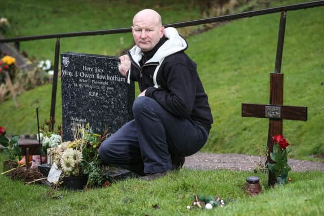 Greengrocer Andrew Bray, a friend of Last of the Summer Wine stars Peter Sallis and Bill Owen, at their graves in Holmfirth. Picture: SWNS