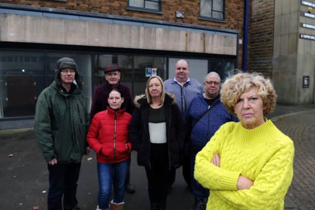 Dozens of bank branch closures are planned across Yorkshire next year, in Wath-upon-dearne near Rotherham, the village's four branches have already shut and it has had a major impact on the local community. Locals traders are up in arms about the closure. Pictured outside boarded up Yorkshire Bank branch are Cate Ward and fellow traders and locals.
Picture Jonathan Gawthorpe
2nd January 2018.