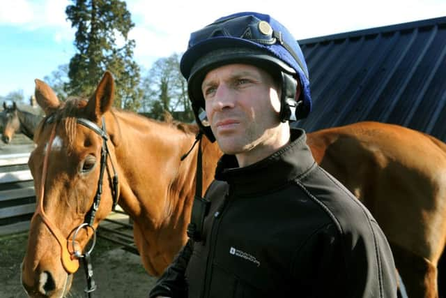 Jockey Danny Cook and Definitly Red.