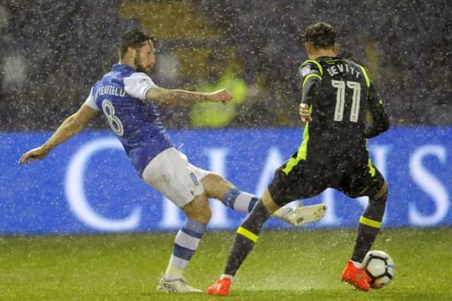 Owls midfielder Jacob Butterfield beats Carlisle's Jamie Devitt