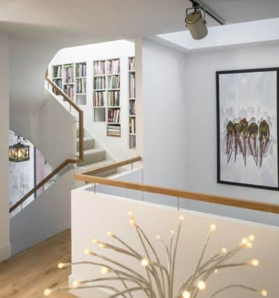 The bookshelves were Mike's design idea. the lantern light, left, is from his parents cottage