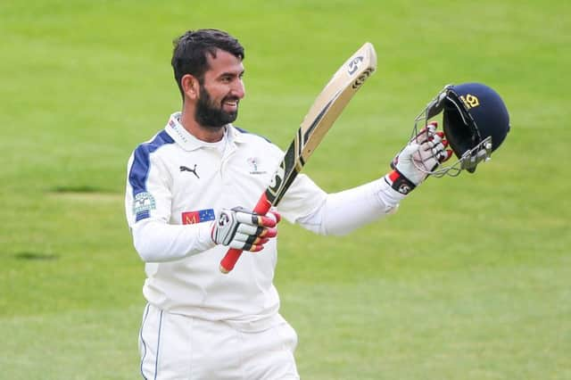 Back for more:  Yorkshire's Cheteshwar Pujara celebrating his century against Hampshire.