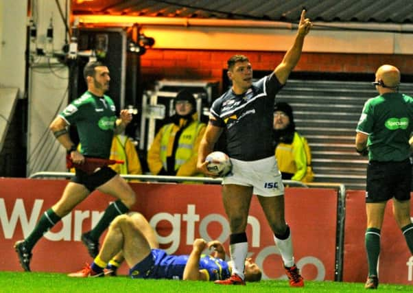 Rhinos' Ryan Hall celebrates his second try.