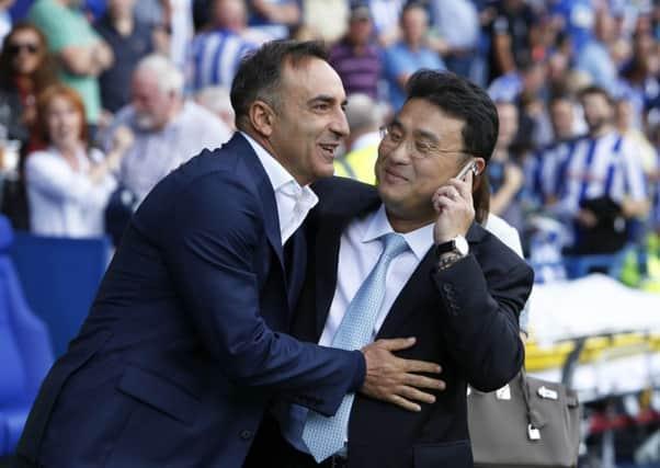 WE'LL MEET AGAIN: Former Sheffield wednesday head coach Carlos Carvalhal with Owls owner Dejphon Chansiri.