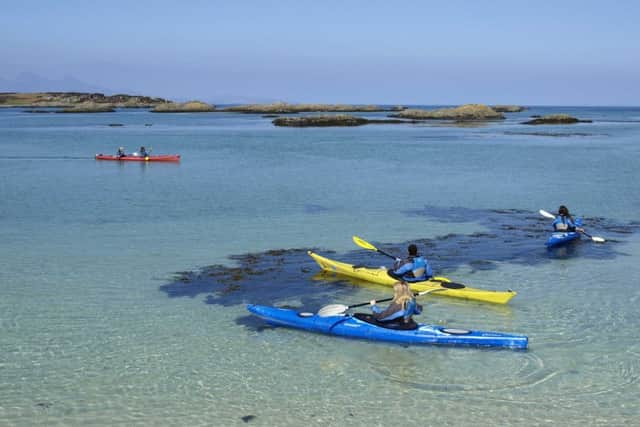 Kayaking in the Scottish Highlands. PA Photo/Flash Pack.