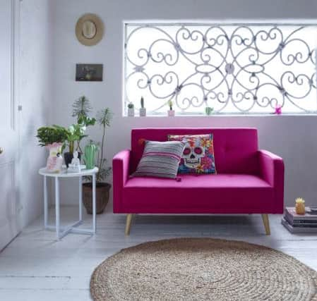 Ramona sofa, Â£149, skull cushion, Â£6, and pom pom cushion, Â£7, from George Home at Asda or www.direct.asda.com