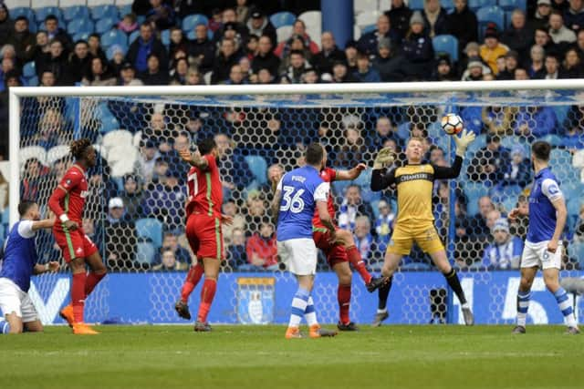 Fantastic save: Owls goalkeeper Cameron Dawson denies Swansea's Mike van der Hoorn. Picture: Steve Ellis