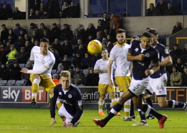 Owls' Joey Pelupessy scores.....Piuc Steve Ellis