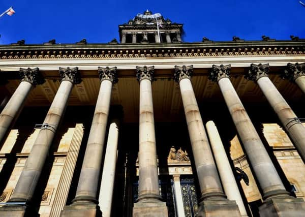 070218  One of the weathered stone lions  alongside the pillars of Leeds Town Hall.
Pictures taken on a Nikon D3s camera with a 12-24 mm lens at 19mm , with an exposure of 1/250th sec at f9 with an ISO 0f 320.