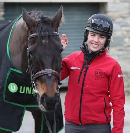 Kate Harrington with Cheltenham Gold Cup winner Sizing John during yesterdays open day at trainer Jessica Harringtons Commonstown Stables in Moone, Ireland (Picture: Niall Carson/PA Wire).