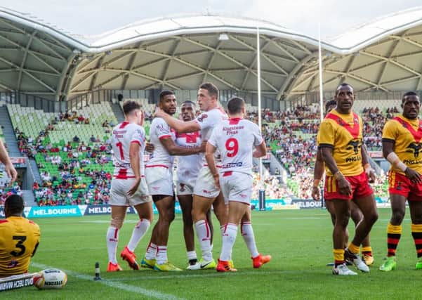 England players celebrate a try by Kallum Watkins at the World Cup. Picture: Brendon Ratnayake/SWpix.com/PhotosportNZ