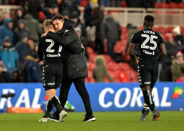 Paul Heckingbottom has a word with Samuel Saiz at full time.