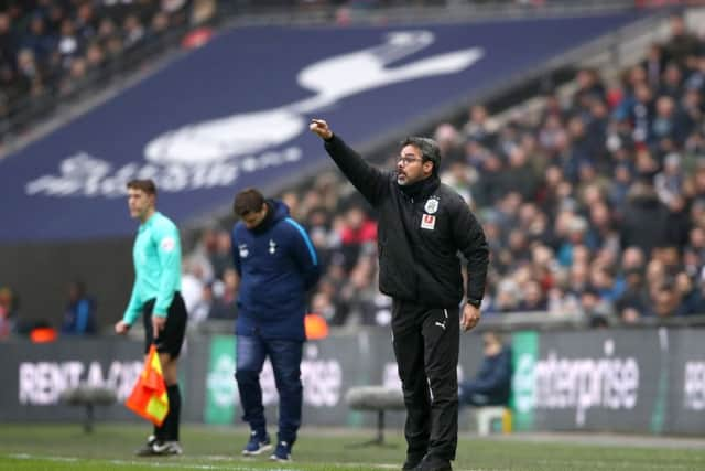 Huddersfield Town manager David Wagner gestures on the touchline.