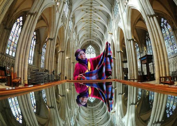 Days for Grls Sewing Workshop at York Minster..Issy Sanderson is pictured checking out the material at the workshop..5th March 2018 ..Picture by Simon Hulme