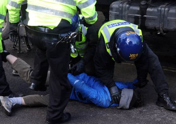 Police clash with tree protesters in Sheffield.