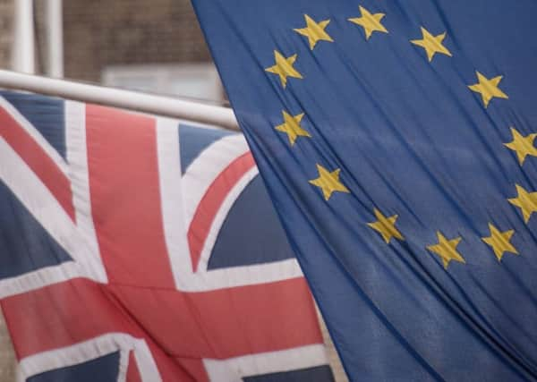 EU and Union flags. Photo : Stefan Rousseau/PA Wire