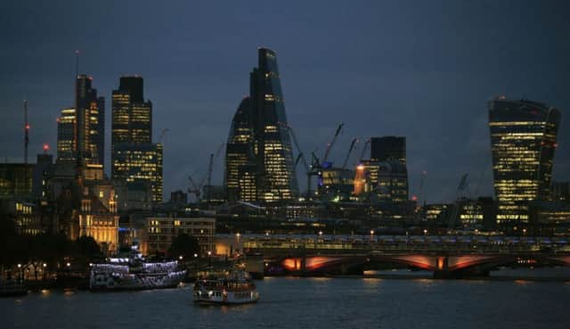 The City of London skyline at dusk. Photo: Jonathan Brady/PA Wire