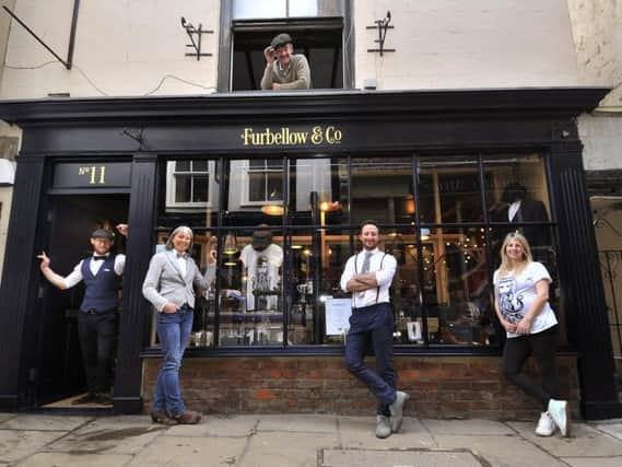 Furbellow & Co. A family affair with Mark Parkin, mum Karen Parkin, Liam Parkin and Ceri Parkin, plus Neil Cook (top) who helped renovate the shop. Danielle Parkin is also a co-owner but not pictured. Picture by Richard Ponter.